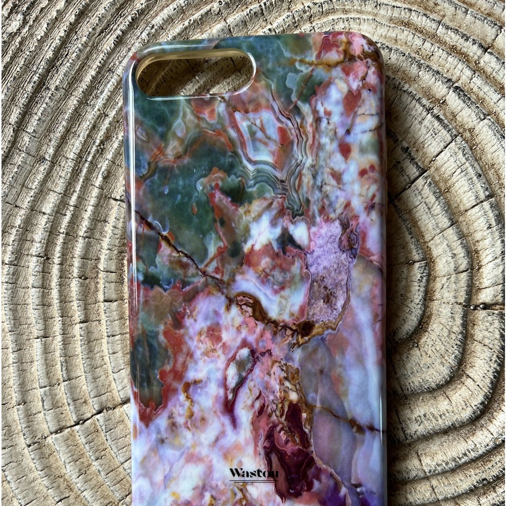 Gently used multi colored iPhone 6 cell phone case.